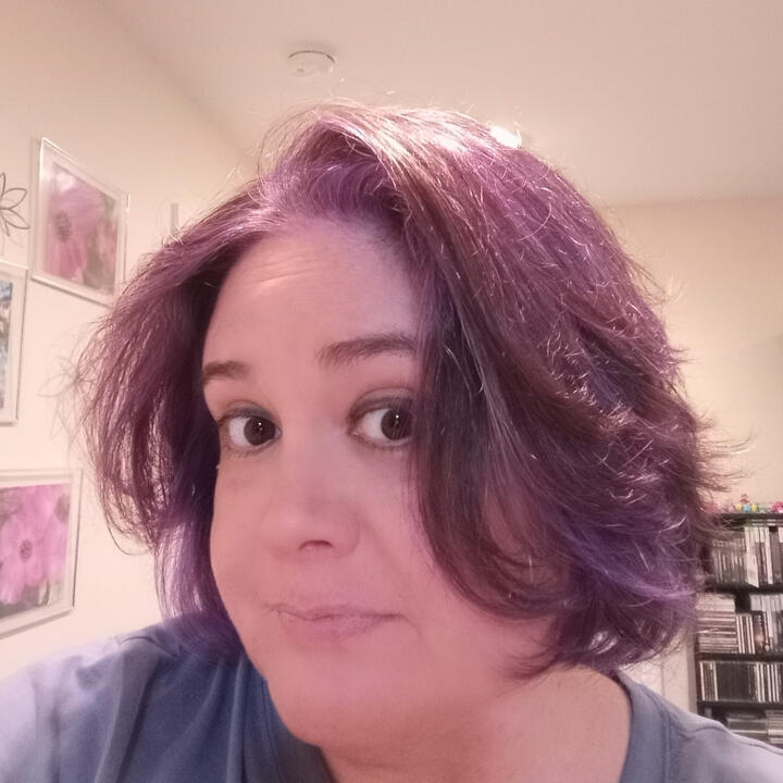 Woman with purple hued hair